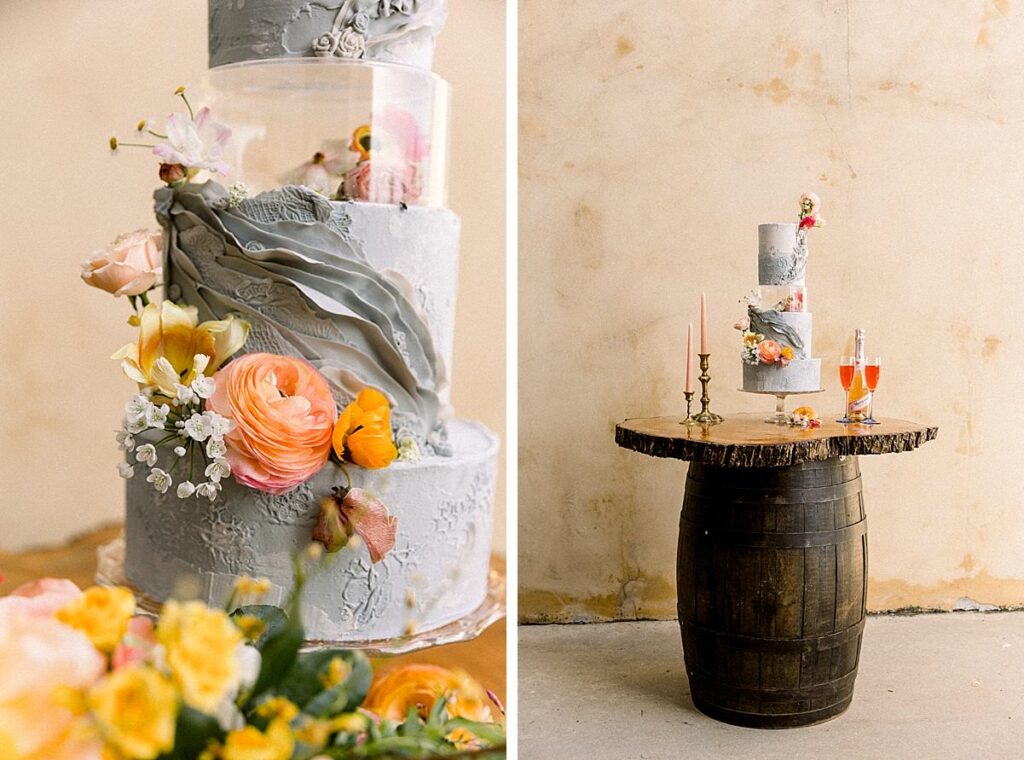 Details of an ornate wedding cake on a wooden barrel stand 