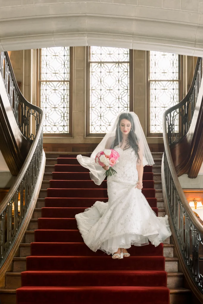 bride walking down the stairs at the Callanwolde Fine Arts Center Wedding venue