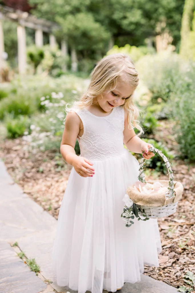 flower girl during a wedding at the Cator Woolford Gardens Wedding Venue