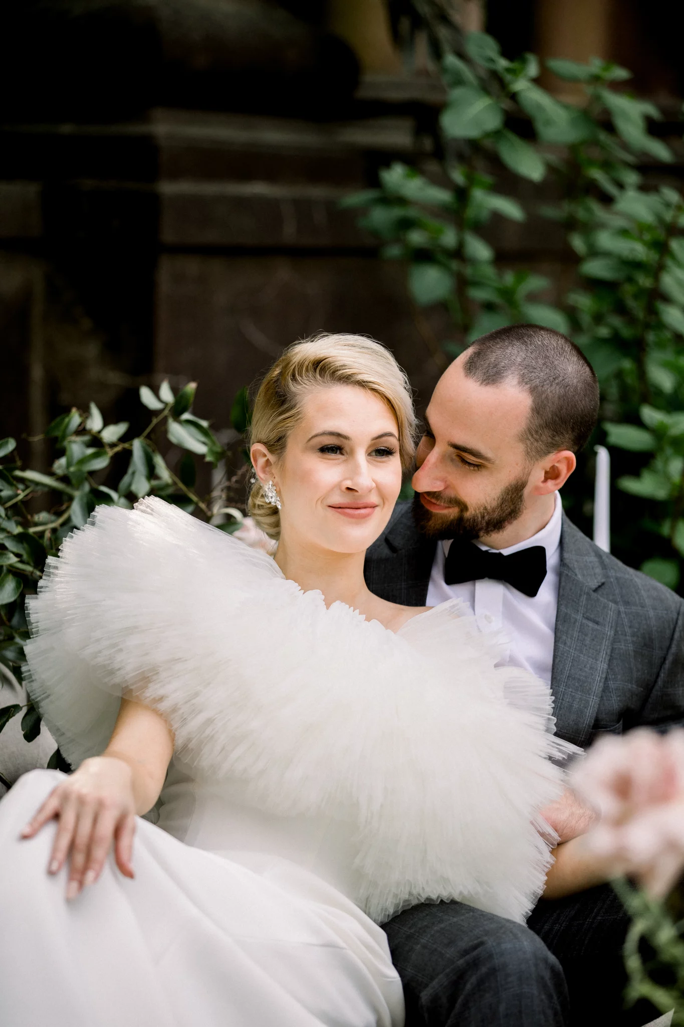 bride and groom snuggling a swan house wedding in Atlanta GA