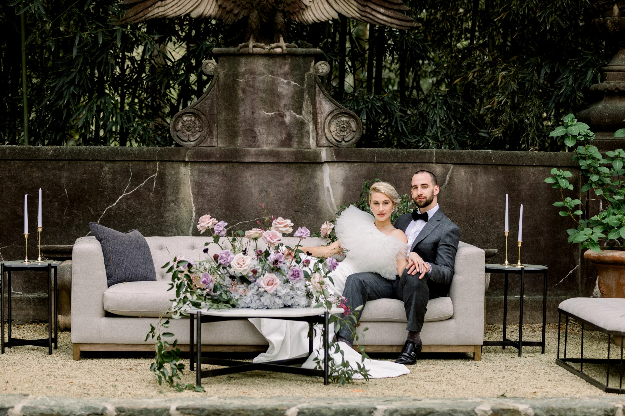 bride and groom sitting on a couch a swan house wedding in Atlanta GA