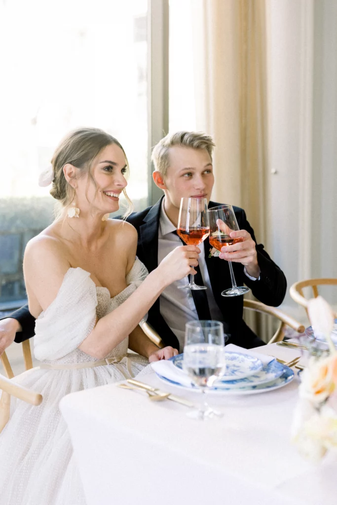 bride and groom sharing a toast at the Waldorf Astoria Atlanta Buckhead Wedding venue