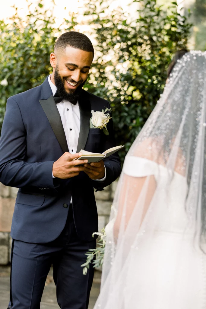 groom sharing his vows with his bride at an Atlanta botanical gardens wedding