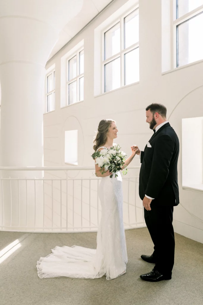 Bride and groom first look at a fernbank museum wedding