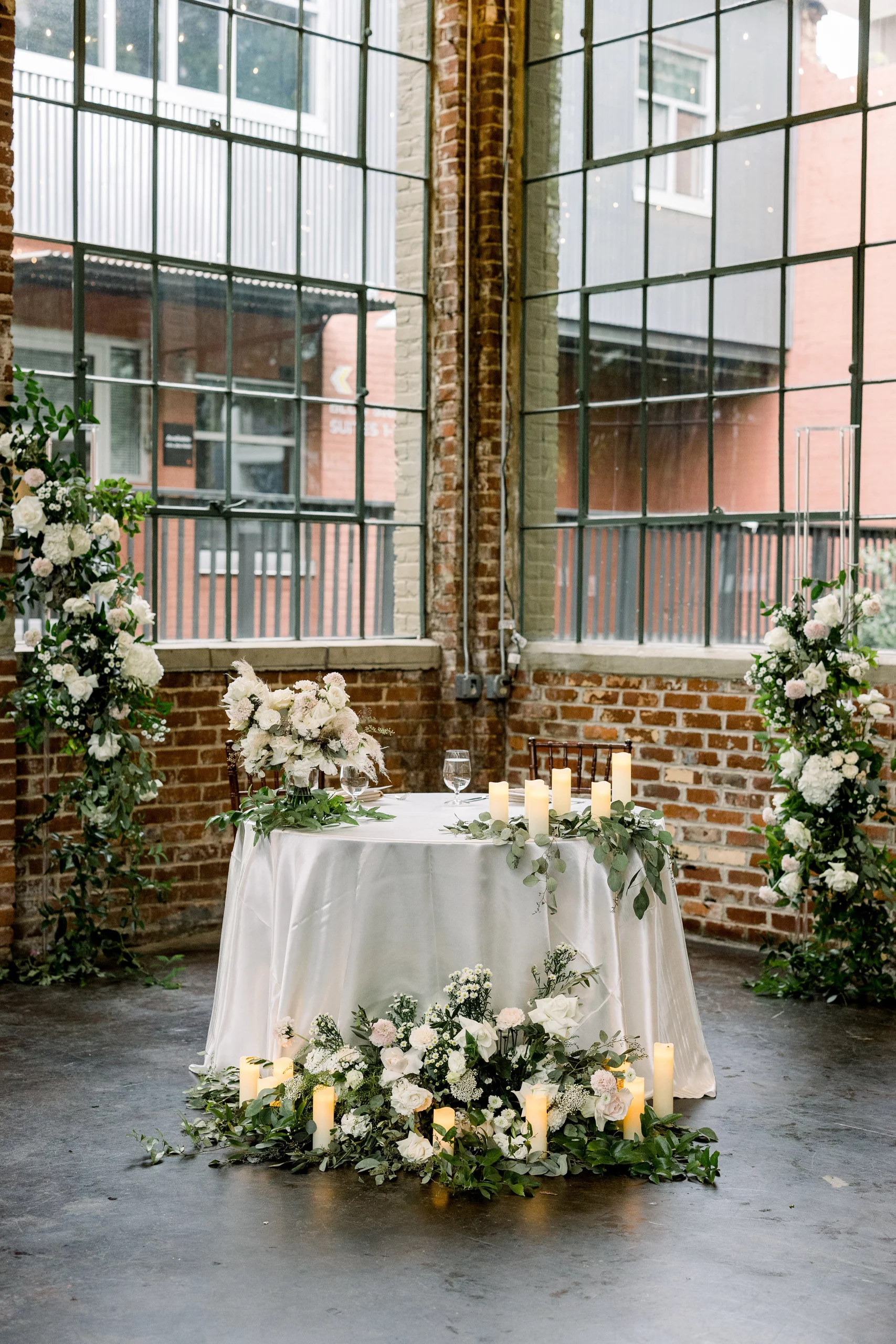 table decor at a foundry at puritan mill wedding