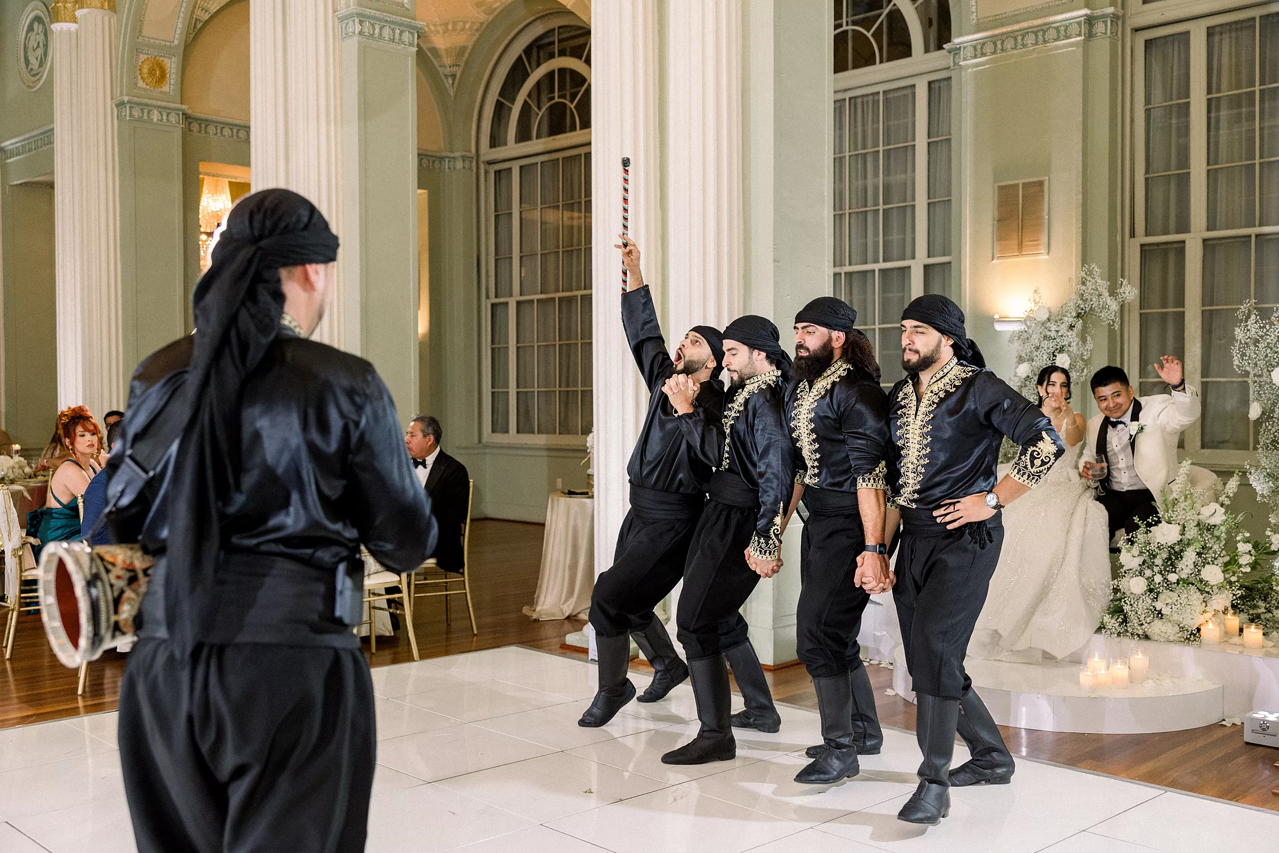 Dancers in all black perform on the dance floor of a Biltmore Ballrooms Wedding 
