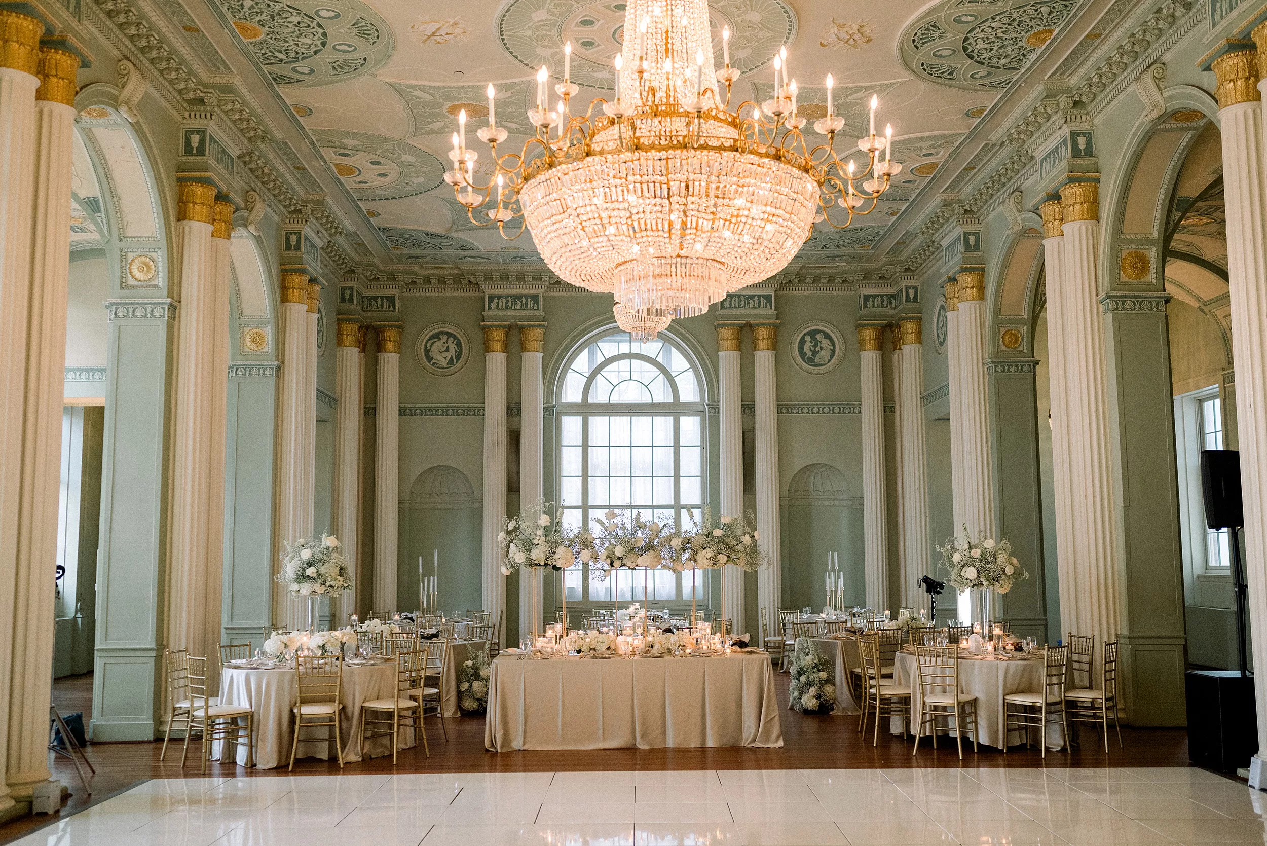 Details of a crystal chandelier and wedding reception setup at a Biltmore Ballrooms Wedding