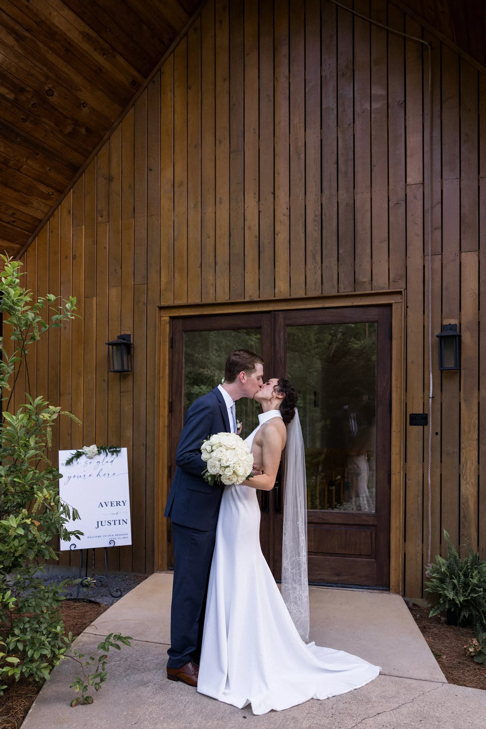 Newlyweds kiss in front of the Juliette Chapel Wedding venue
