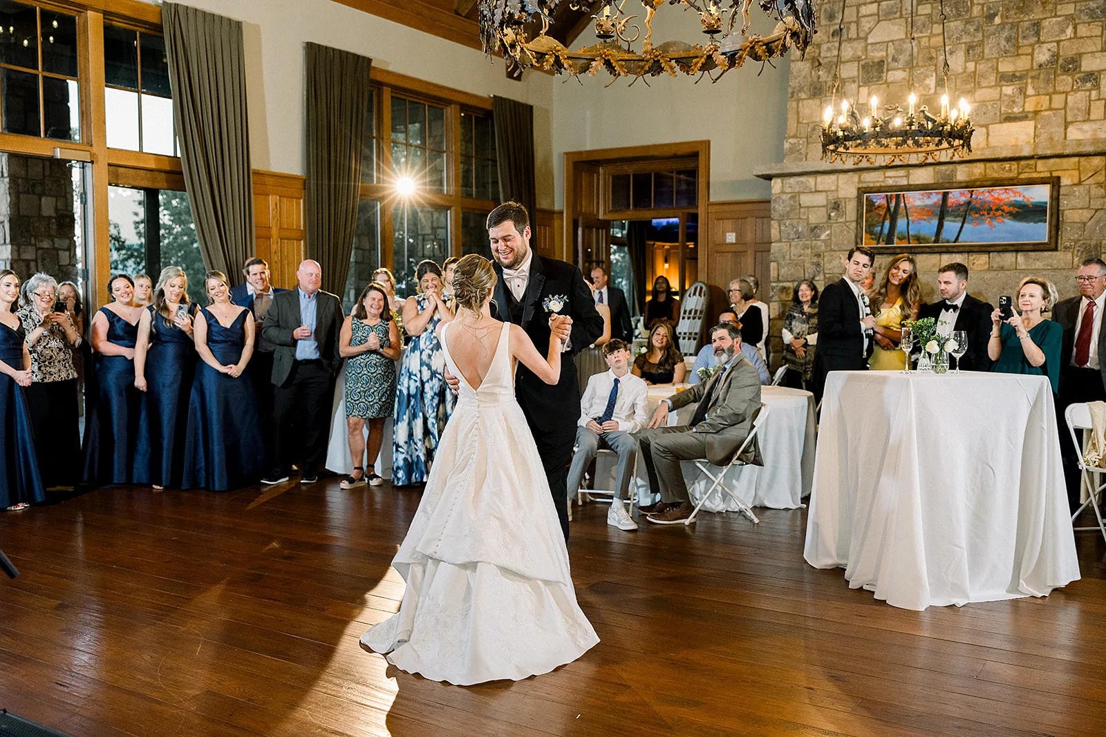 Newlyweds dance for the first time in front of their guests at the Curahee Club Wedding venue