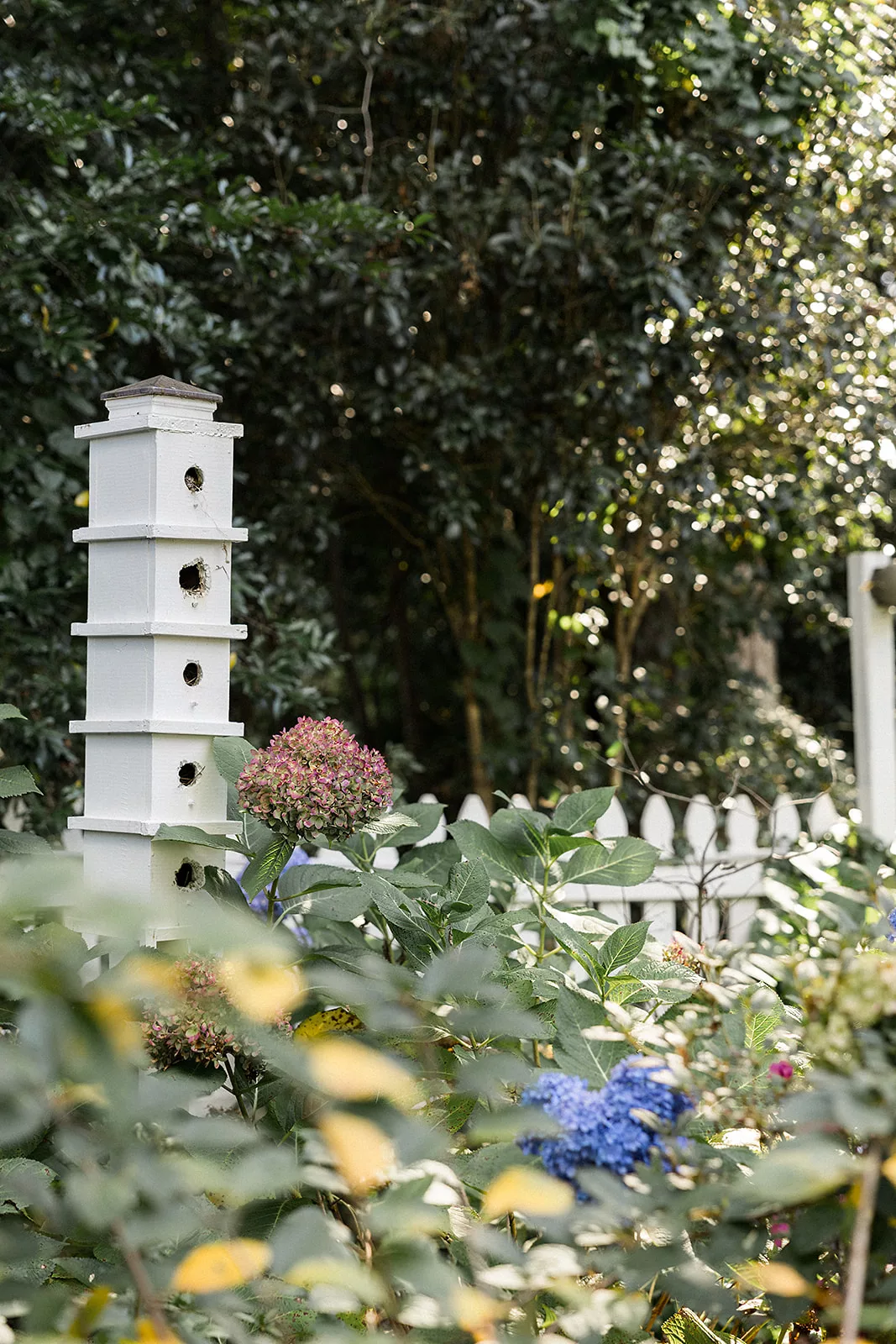Details of bird houses sitting in flowers at the Wildflower 301 gardens