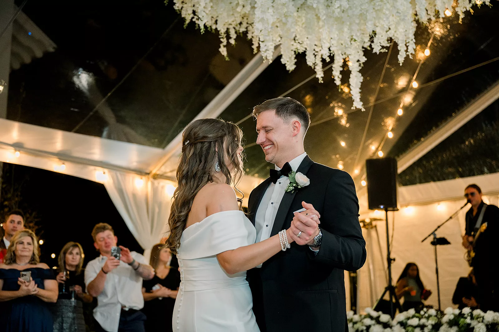 Newlyweds dance to a live band at their The Chapel Athens wedding reception