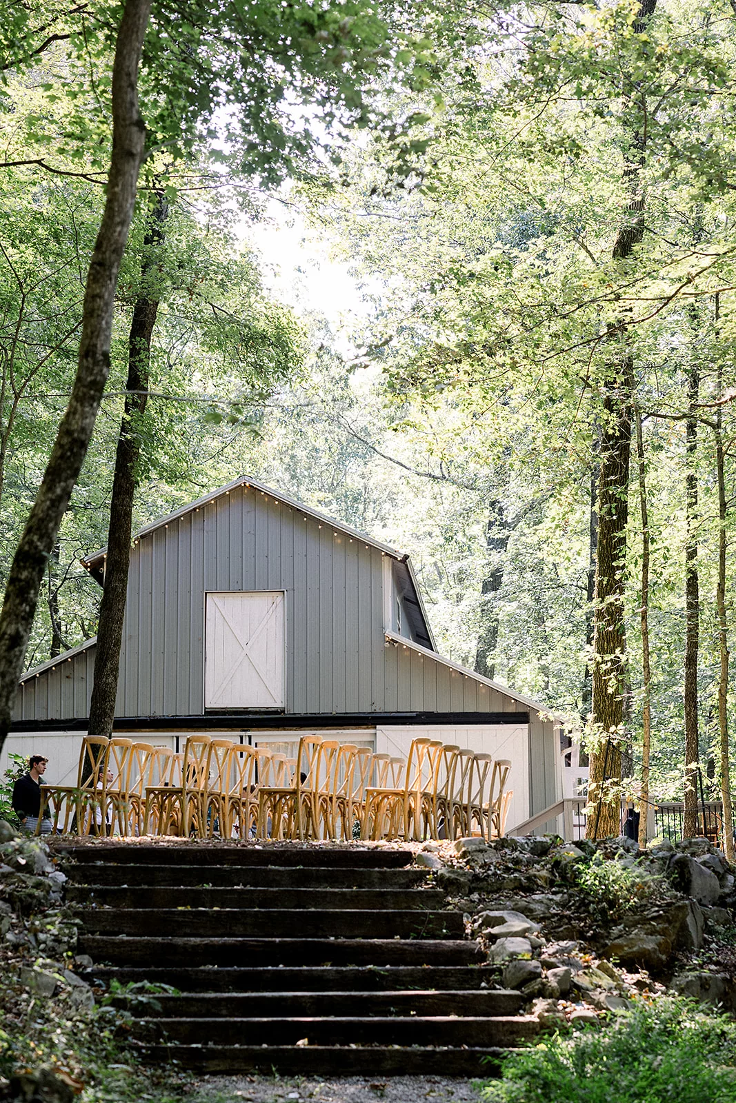 A Sustainable Wedding Venue in the forest set up for an outdoor wedding reception